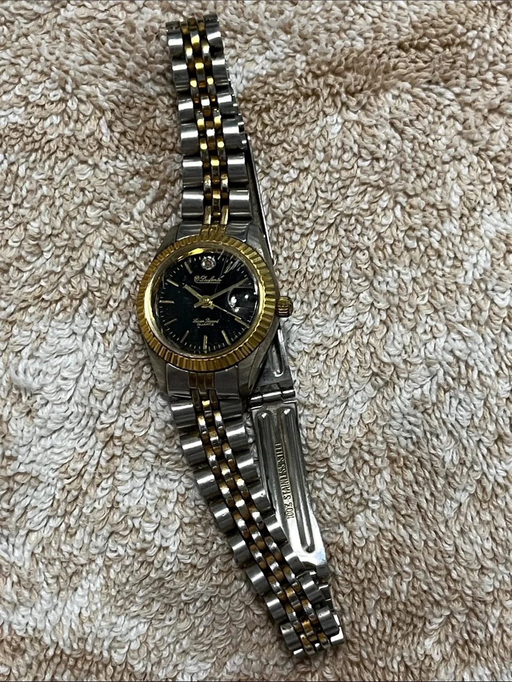 Two-Tone Women's Dress Watch with Black Dial and Gold Accents